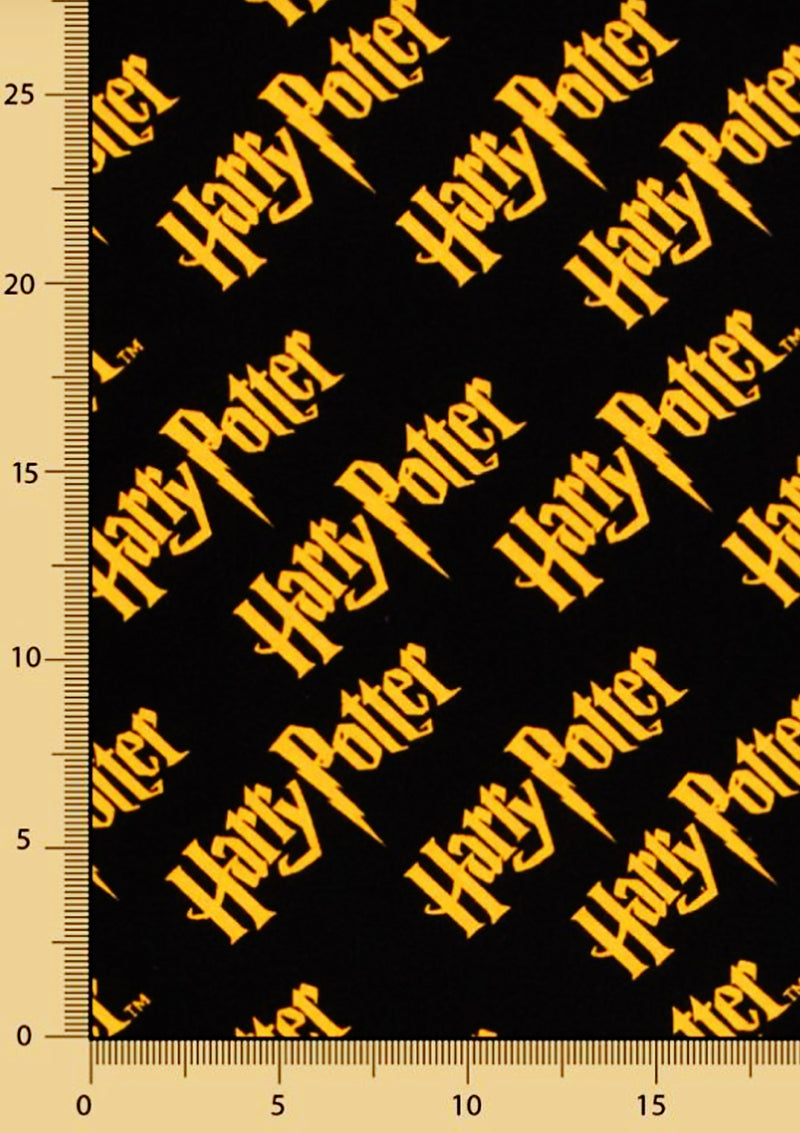 44" 100% Craft Cotton Harry Potter Black & Yellow Tm Logo Print Fabric D